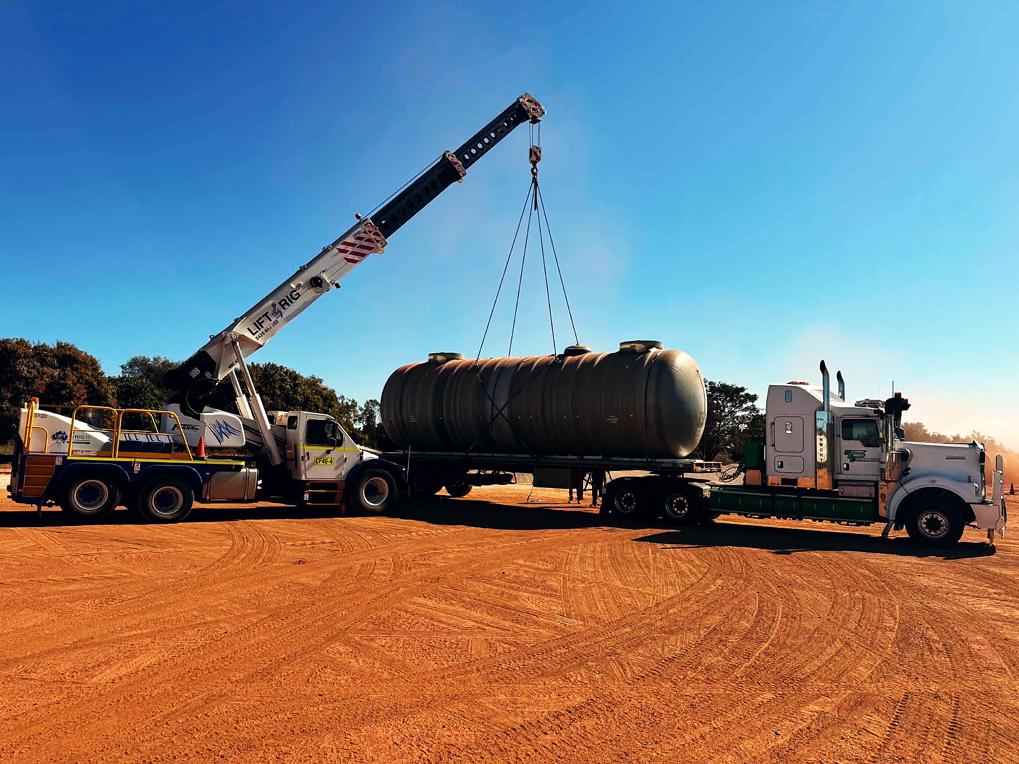 Fuel tank delivered by truck and crane to a Premium Fuel Installations site